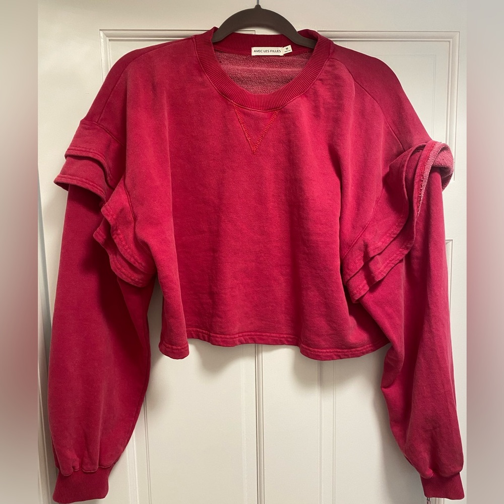 Pink ruffled sweatshirt